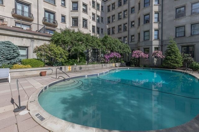 a view of a building with a garden