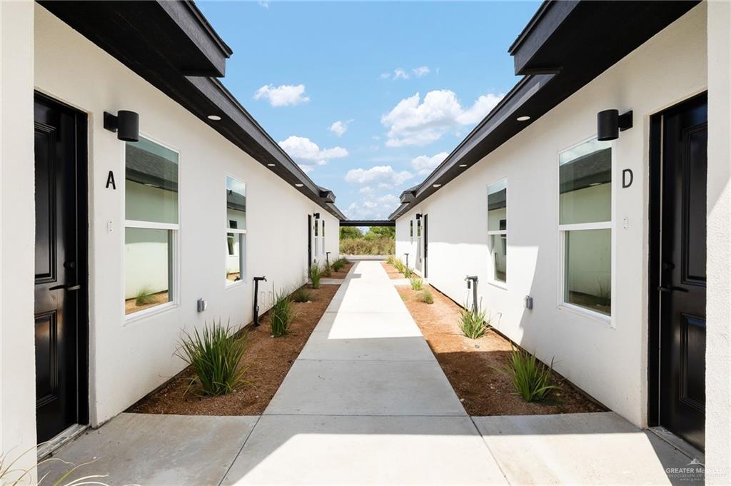 11509 North 25th Street, Unit A McAllen, TX 78504 - Photo 2 of 17 View of side of property featuring stucco siding
