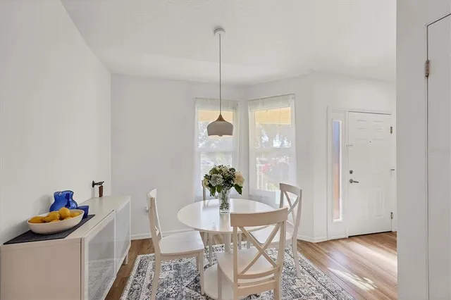 a bathroom with double vanity sinks and a mirror