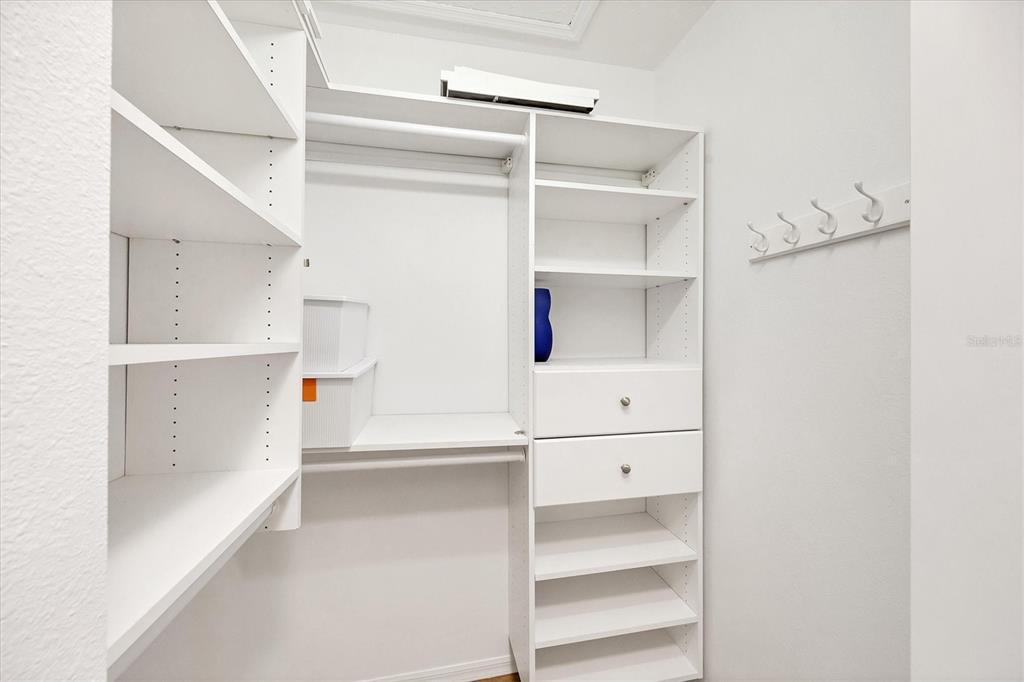 7131 Boca Grove Place, Unit 203 Lakewood Ranch, FL 34202 - Photo 19 of 50 a view of walk in closet with empty racks