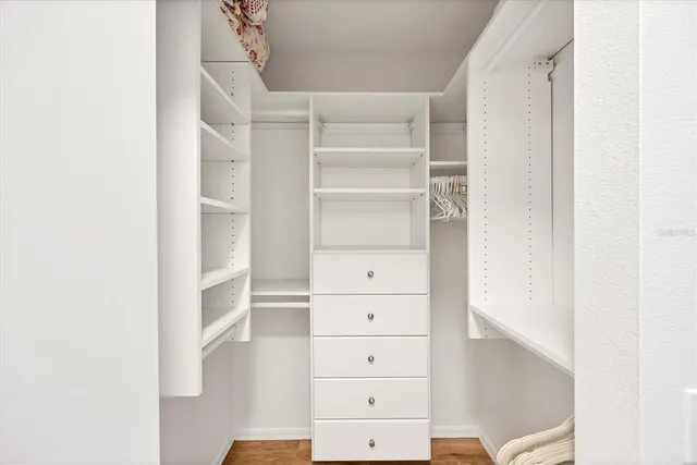 a view of a chairs and table in a balcony