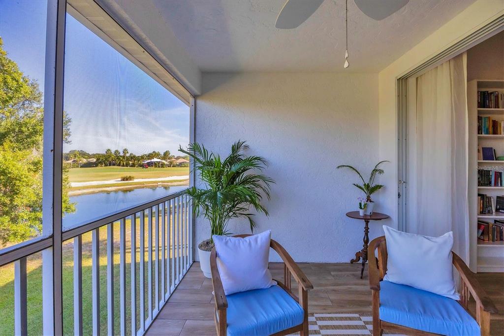 7131 Boca Grove Place, Unit 203 Lakewood Ranch, FL 34202 - Photo 29 of 50 a view of a balcony with chairs