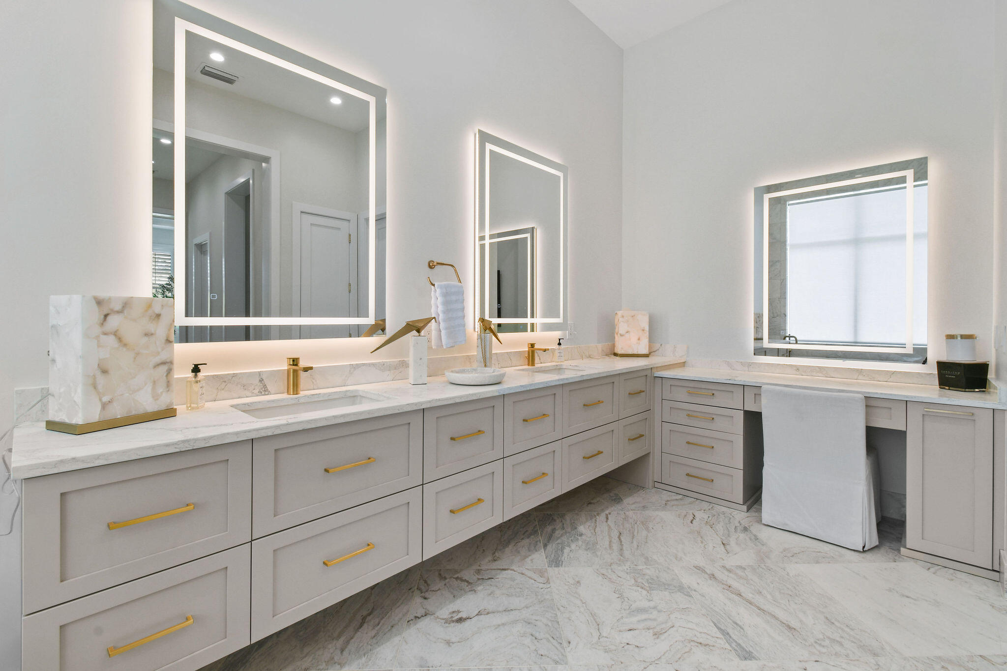 9105 Whippoorwill Trail Jupiter, FL 33478 - Photo 30 of 60 a bathroom with a granite countertop sink mirror and