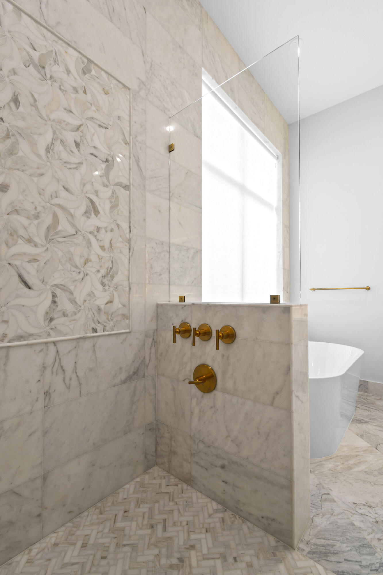 9105 Whippoorwill Trail Jupiter, FL 33478 - Photo 34 of 60 a bathroom with a shower