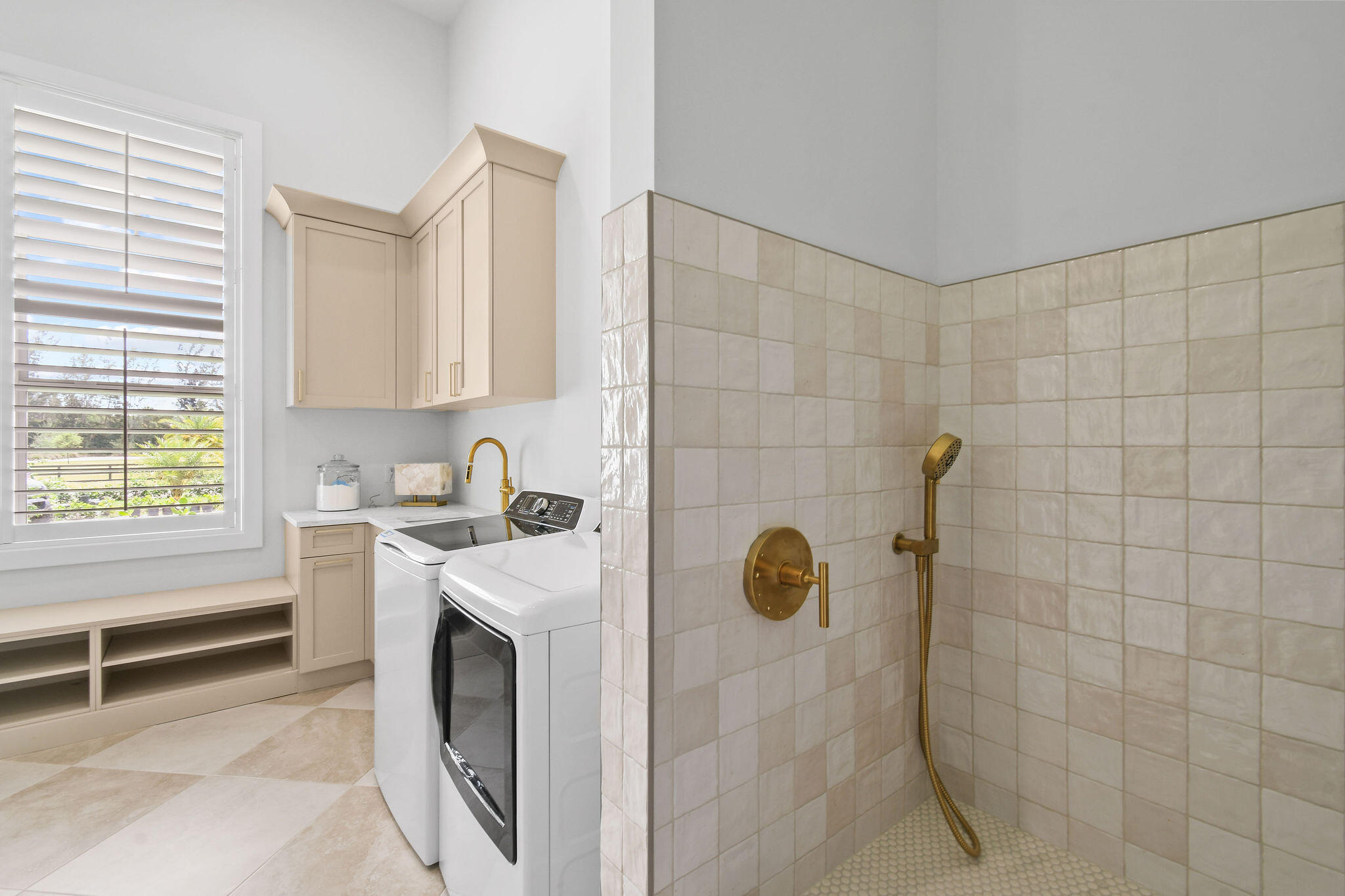 9105 Whippoorwill Trail Jupiter, FL 33478 - Photo 49 of 60 a utility room with a sink a washer and dryer