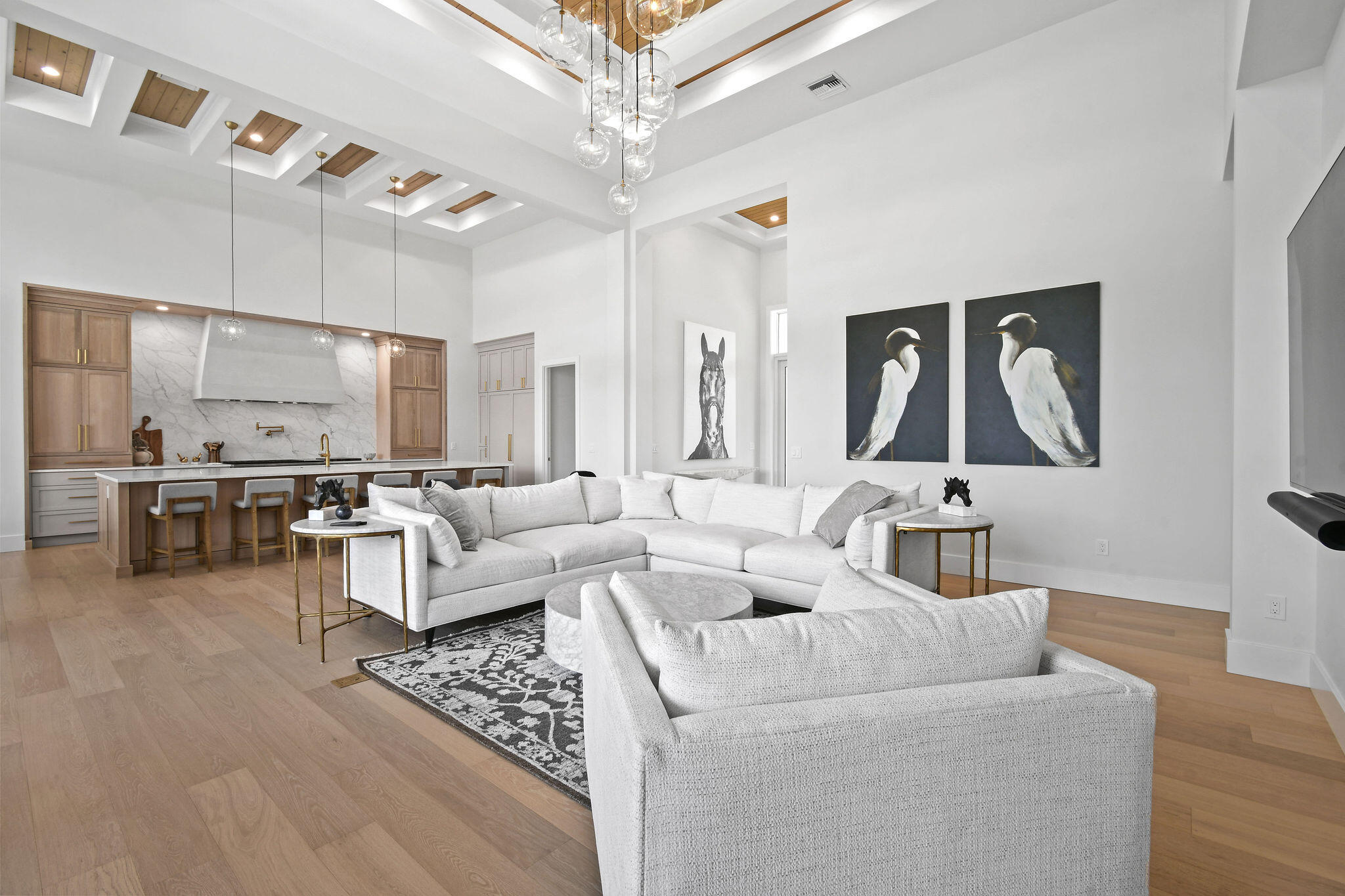 9105 Whippoorwill Trail Jupiter, FL 33478 - Photo 10 of 60 a living room with furniture and a chandelier