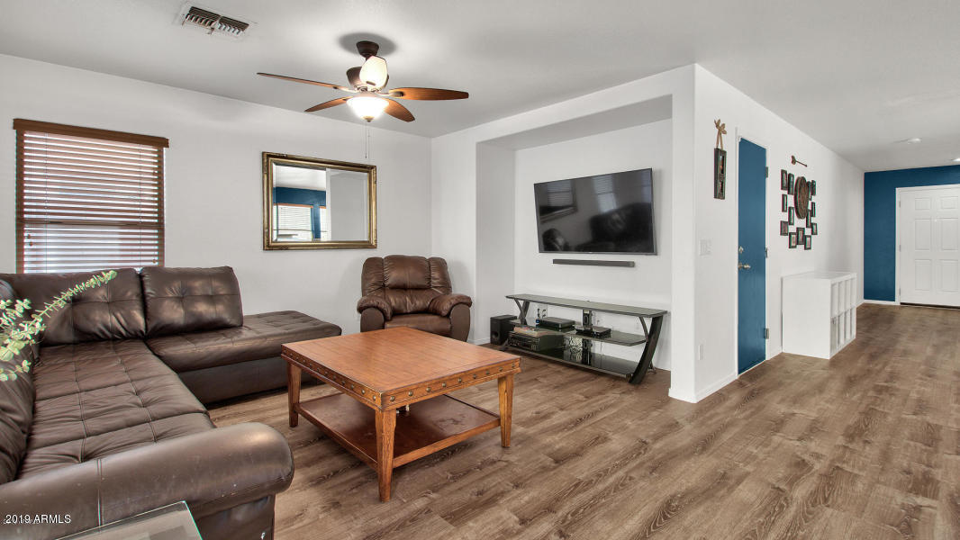 6434 West Harwell Road Laveen, AZ 85339 - Photo 12 of 19 living room angled