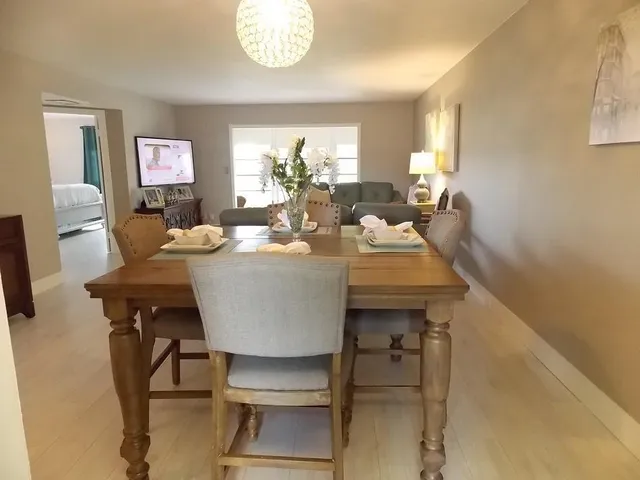 a view of a dining room with furniture