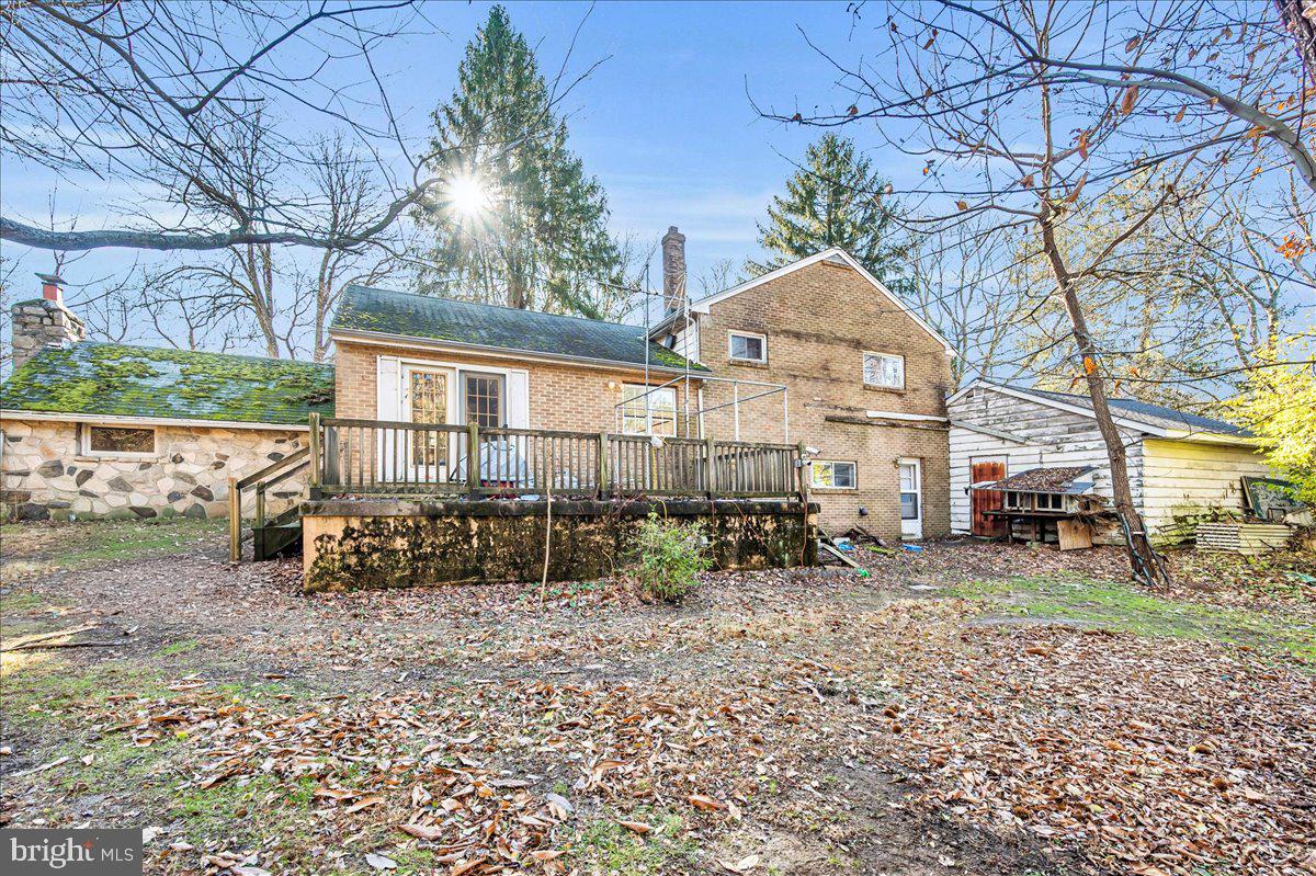 995 Smithbridge Road Glen Mills, PA 19342 - Photo 11 of 20 a view of a house with a yard siting area and garden