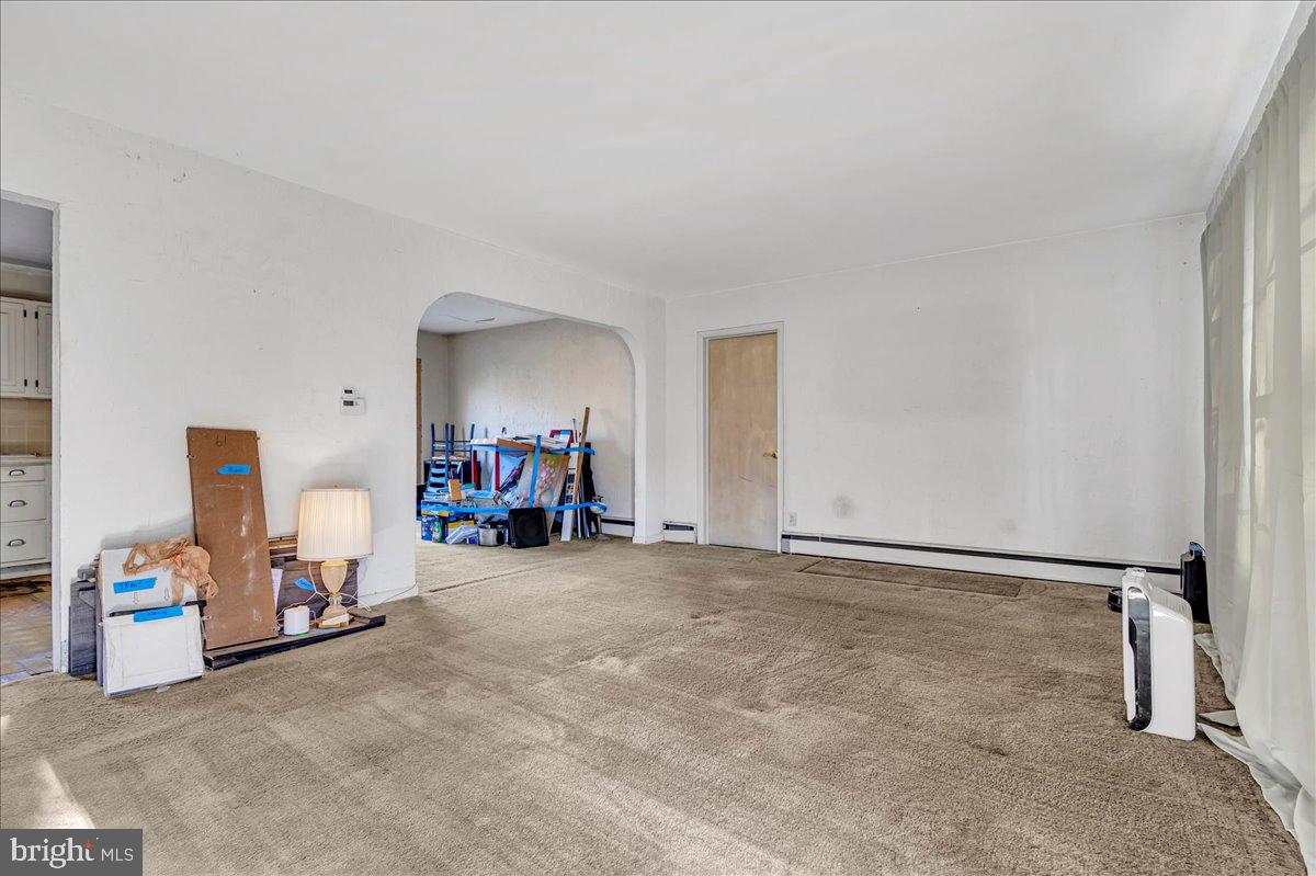 995 Smithbridge Road Glen Mills, PA 19342 - Photo 3 of 20 a view of a room with gym equipment and a large window