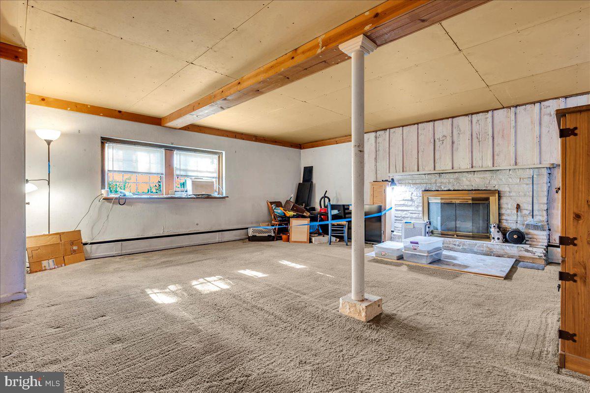 995 Smithbridge Road Glen Mills, PA 19342 - Photo 8 of 20 a view of a livingroom with furniture and a fireplace