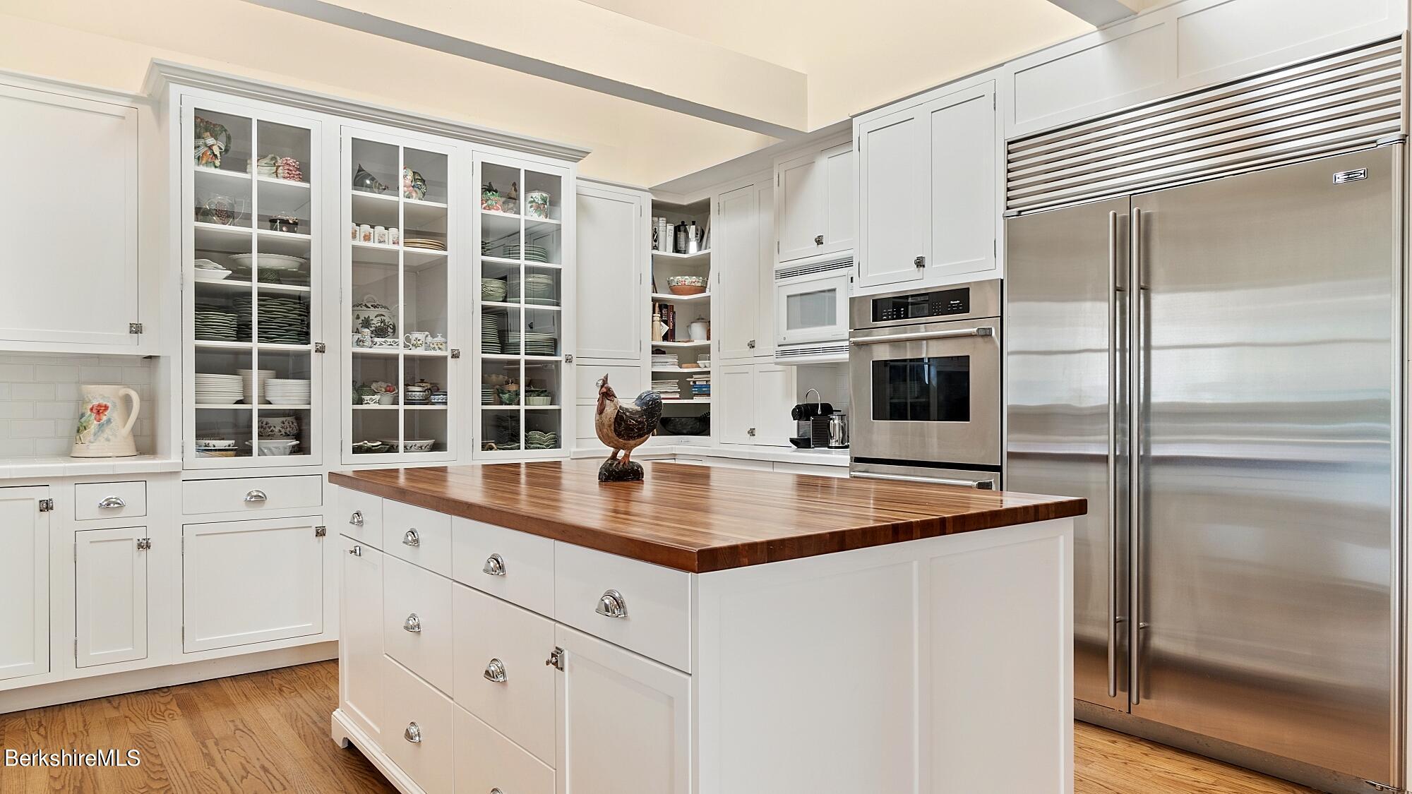 60 Patton Road Richmond, MA 01254 - Photo 14 of 52 a kitchen with stainless steel appliances a sink and a refrigerator