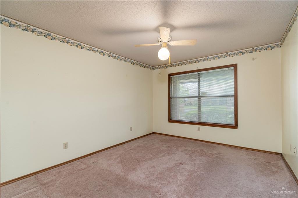 1100 Xanthisma Avenue McAllen, TX 78504 - Photo 17 of 26 an empty room with a window