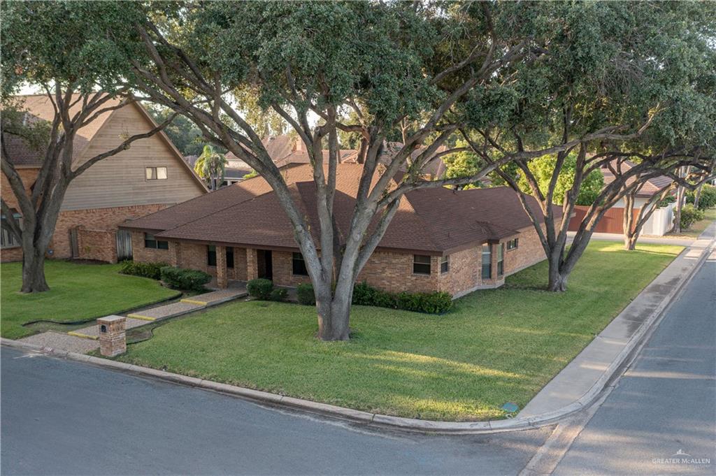 1100 Xanthisma Avenue McAllen, TX 78504 - Photo 21 of 26 a view of house with outdoor space and garden