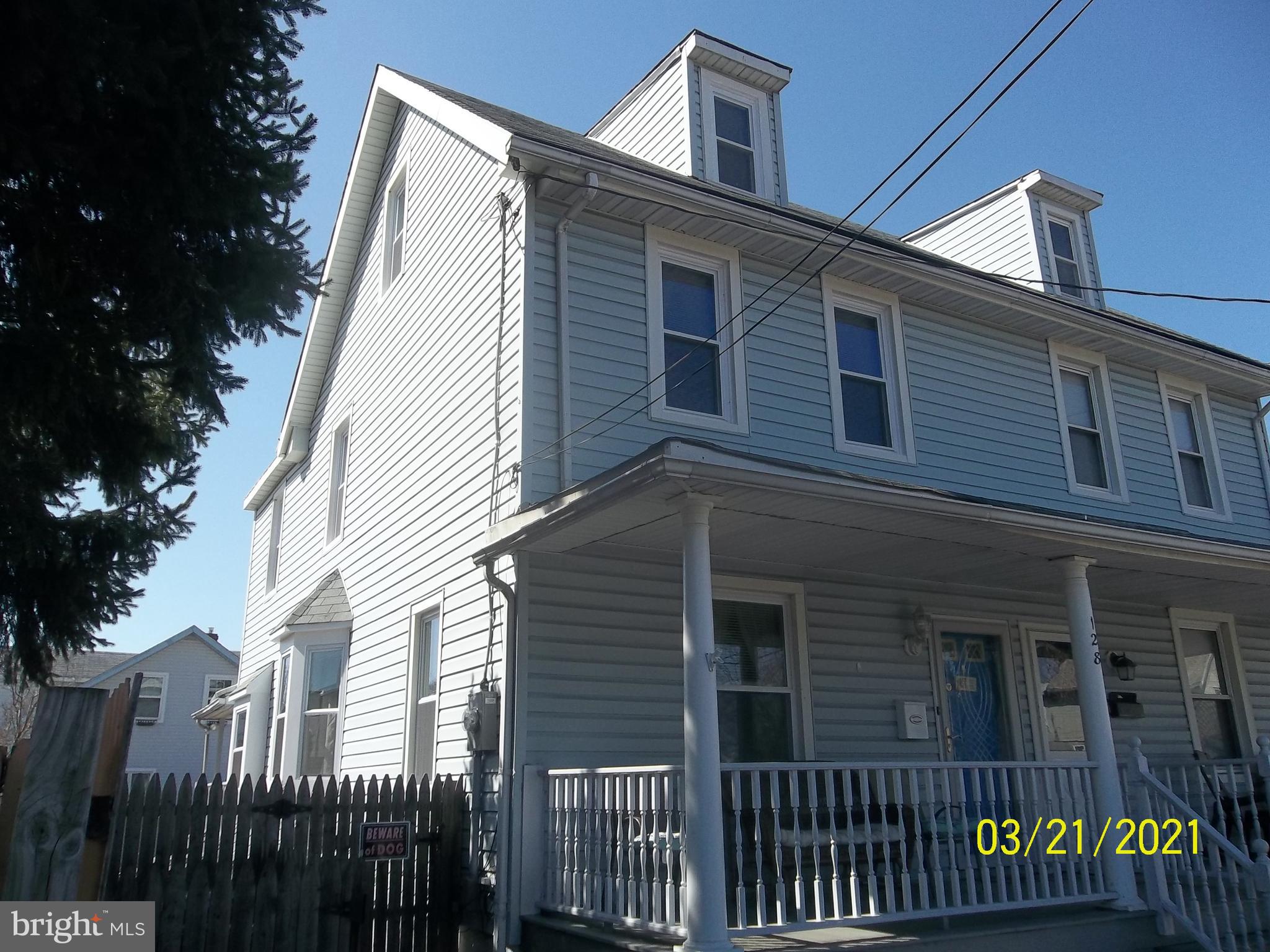 128 Madison Street Riverside, NJ 08075 - Photo 1 of 40 a view of a house with a deck