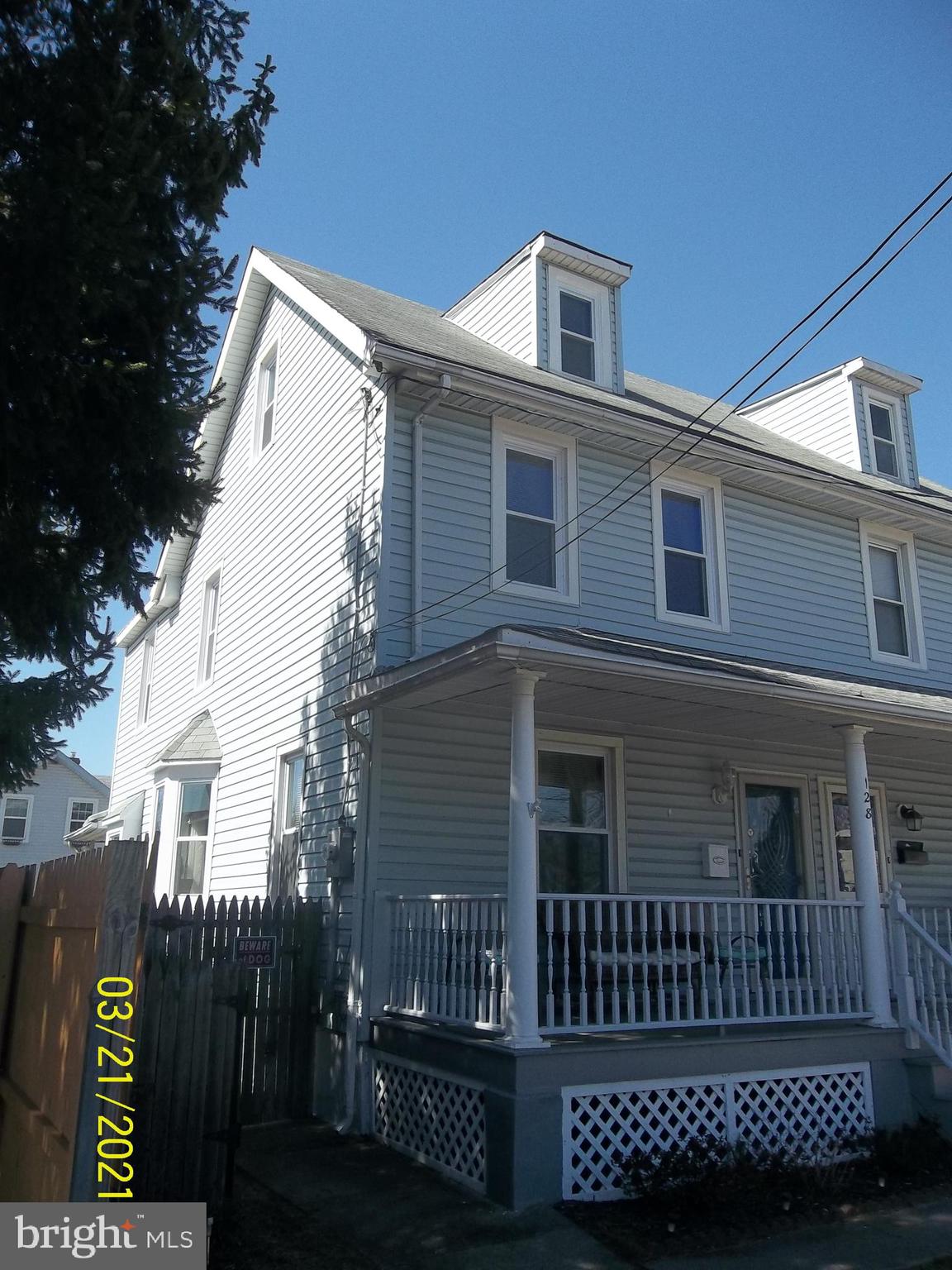 128 Madison Street Riverside, NJ 08075 - Photo 2 of 40 a front view of a house with glass door