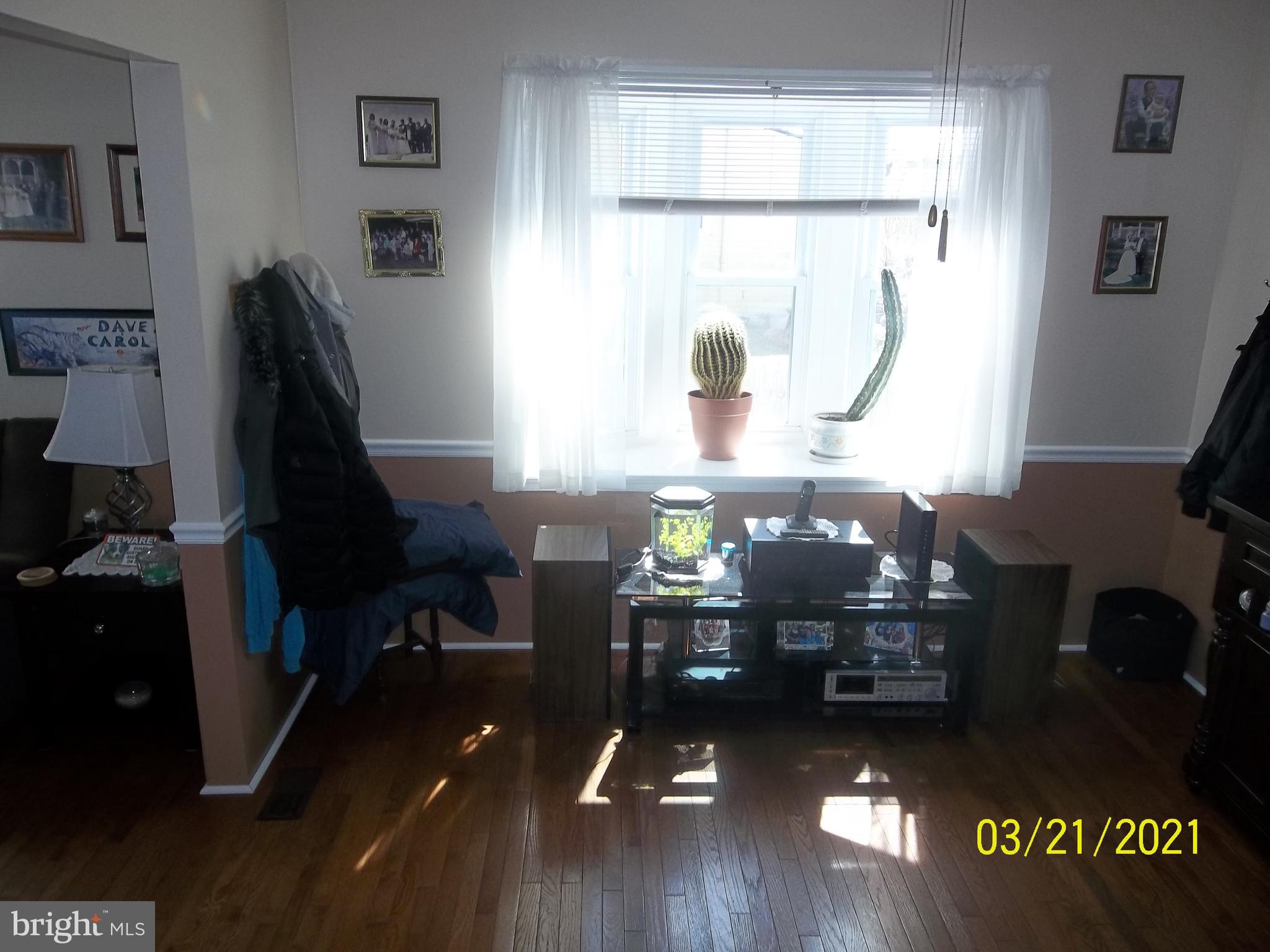 128 Madison Street Riverside, NJ 08075 - Photo 11 of 40 a living room with furniture and wooden floor