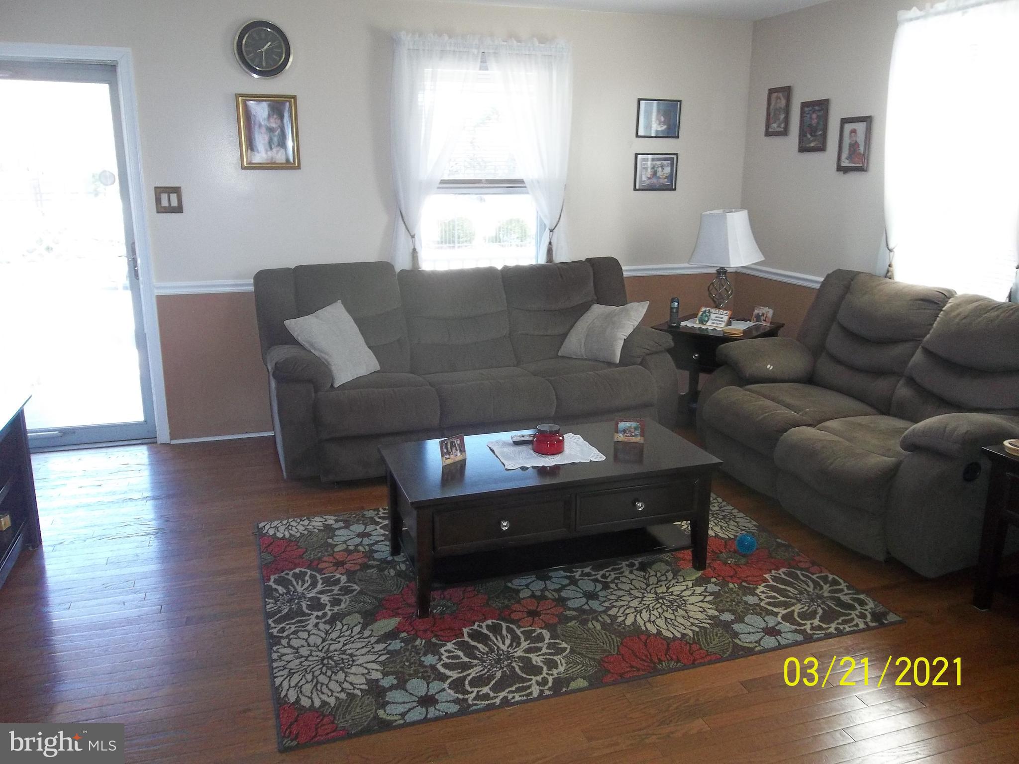 128 Madison Street Riverside, NJ 08075 - Photo 12 of 40 a living room with furniture and a rug