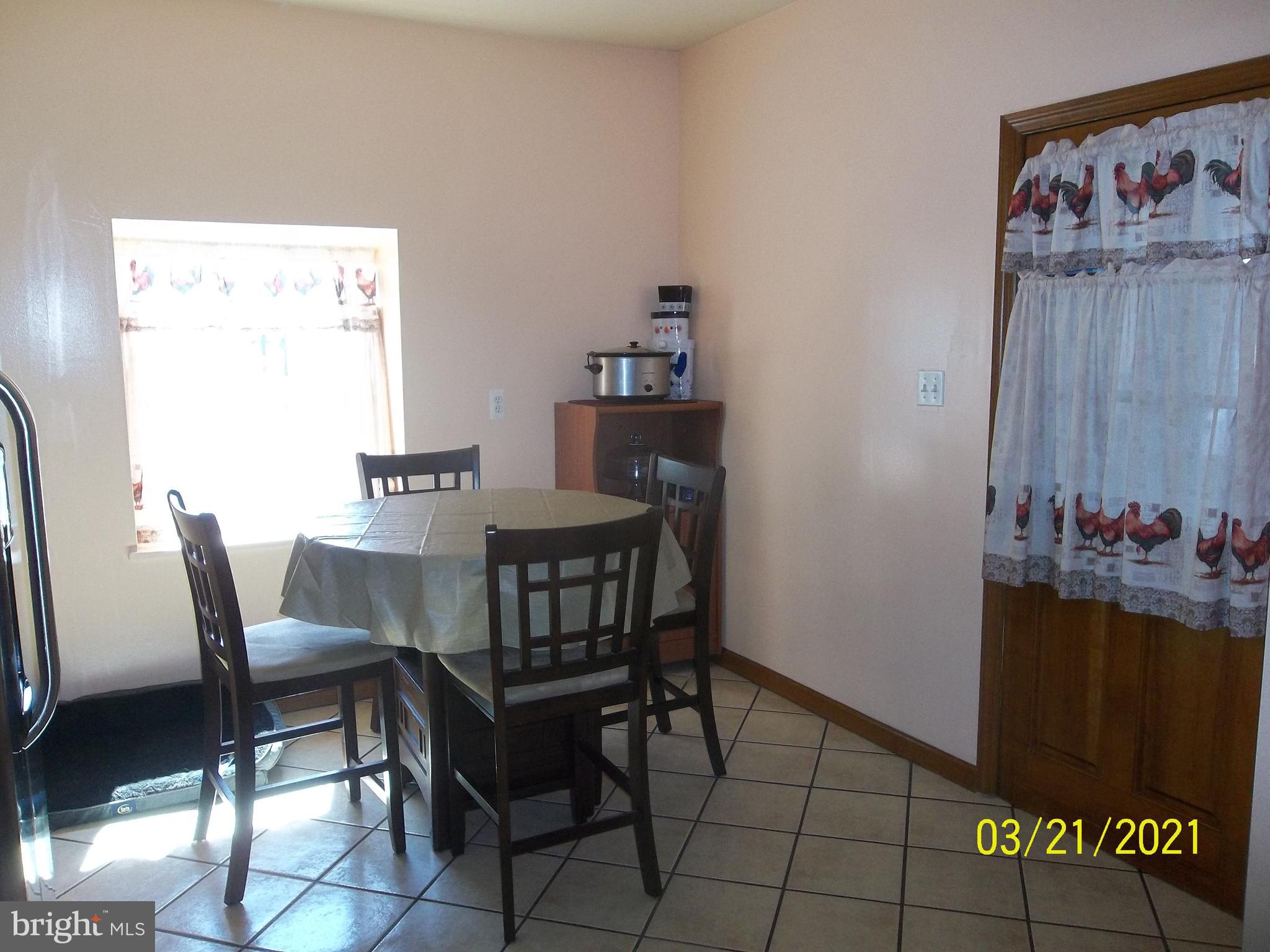 128 Madison Street Riverside, NJ 08075 - Photo 20 of 40 a view of a dining room with furniture