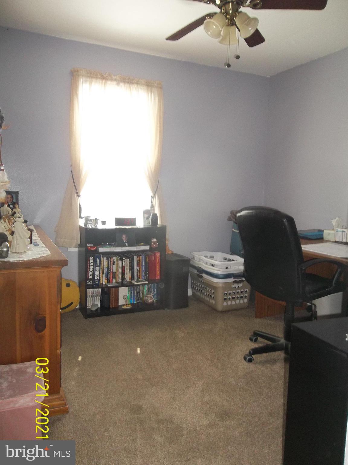 128 Madison Street Riverside, NJ 08075 - Photo 25 of 40 a view of a workspace with furniture and a window