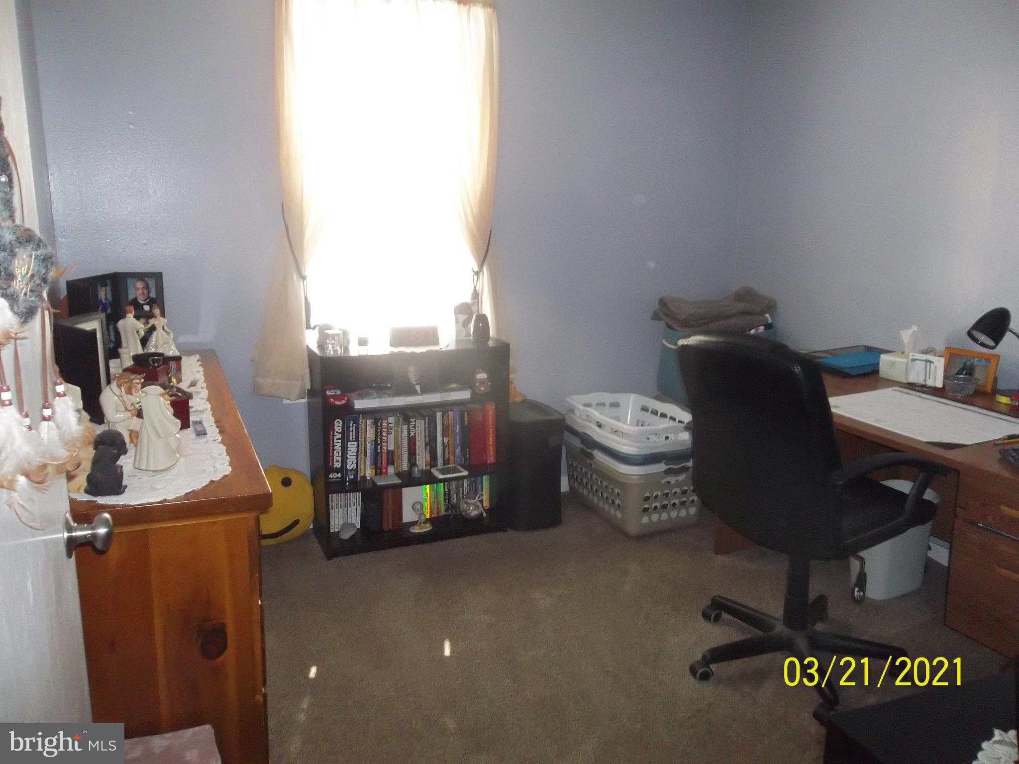 128 Madison Street Riverside, NJ 08075 - Photo 27 of 40 a living room with furniture and a window