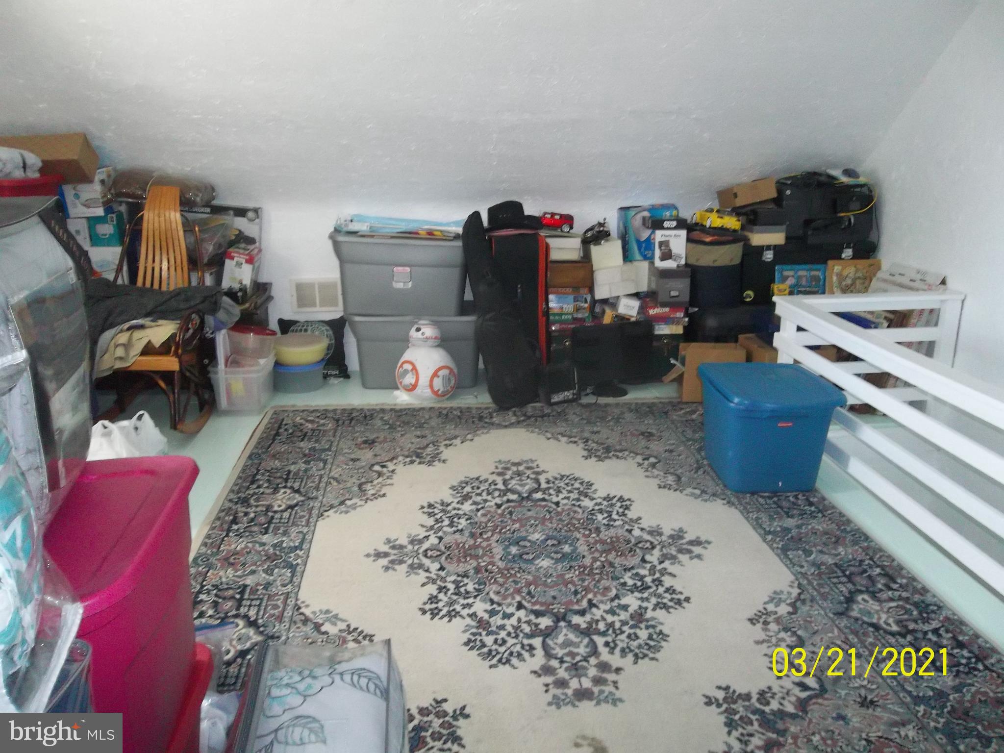 128 Madison Street Riverside, NJ 08075 - Photo 31 of 40 a bed room with a bed and a television