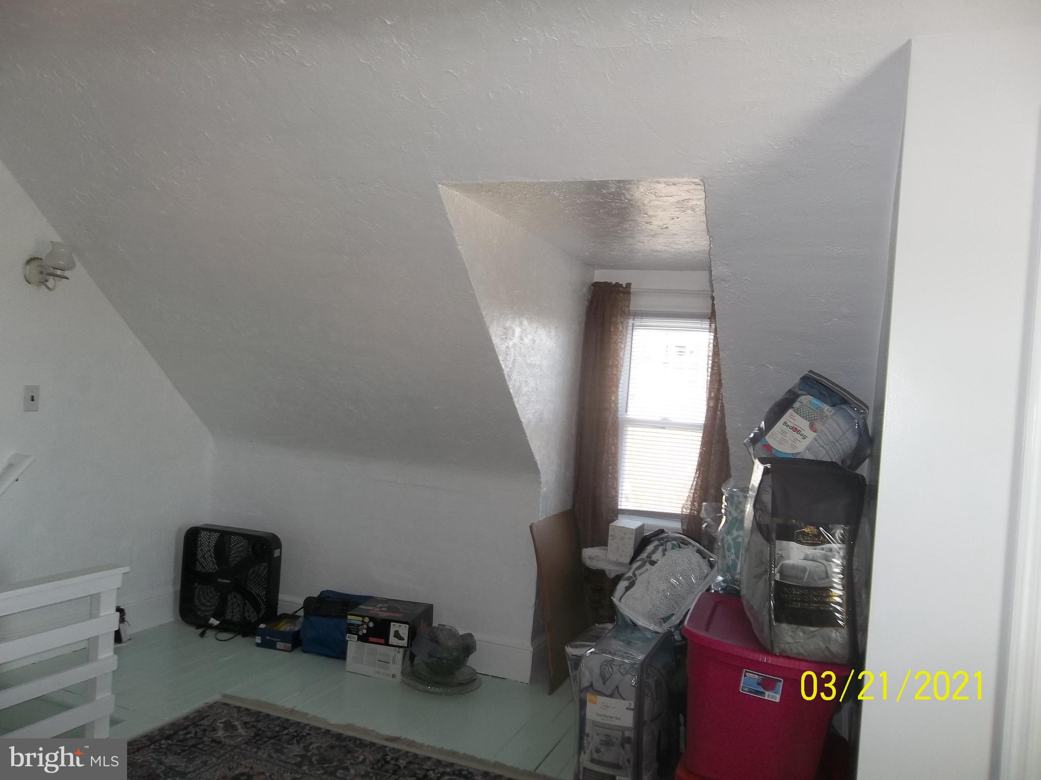 128 Madison Street Riverside, NJ 08075 - Photo 33 of 40 a room with furniture and a mirror