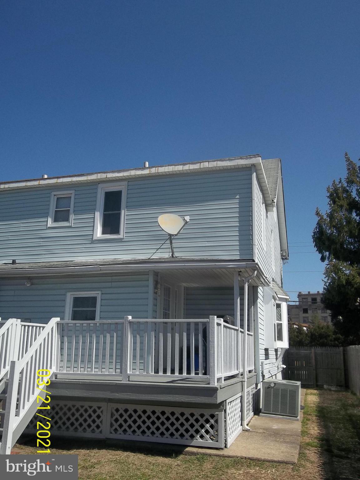 128 Madison Street Riverside, NJ 08075 - Photo 36 of 40 a view of a house with a deck