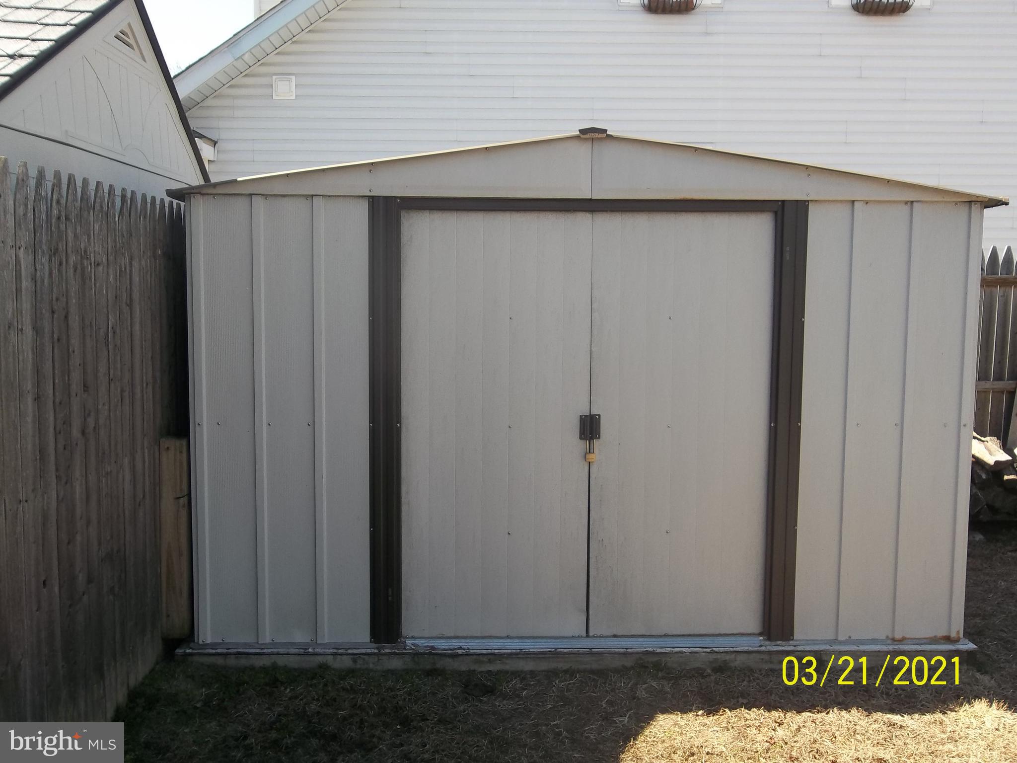 128 Madison Street Riverside, NJ 08075 - Photo 39 of 40 a house with a wooden door