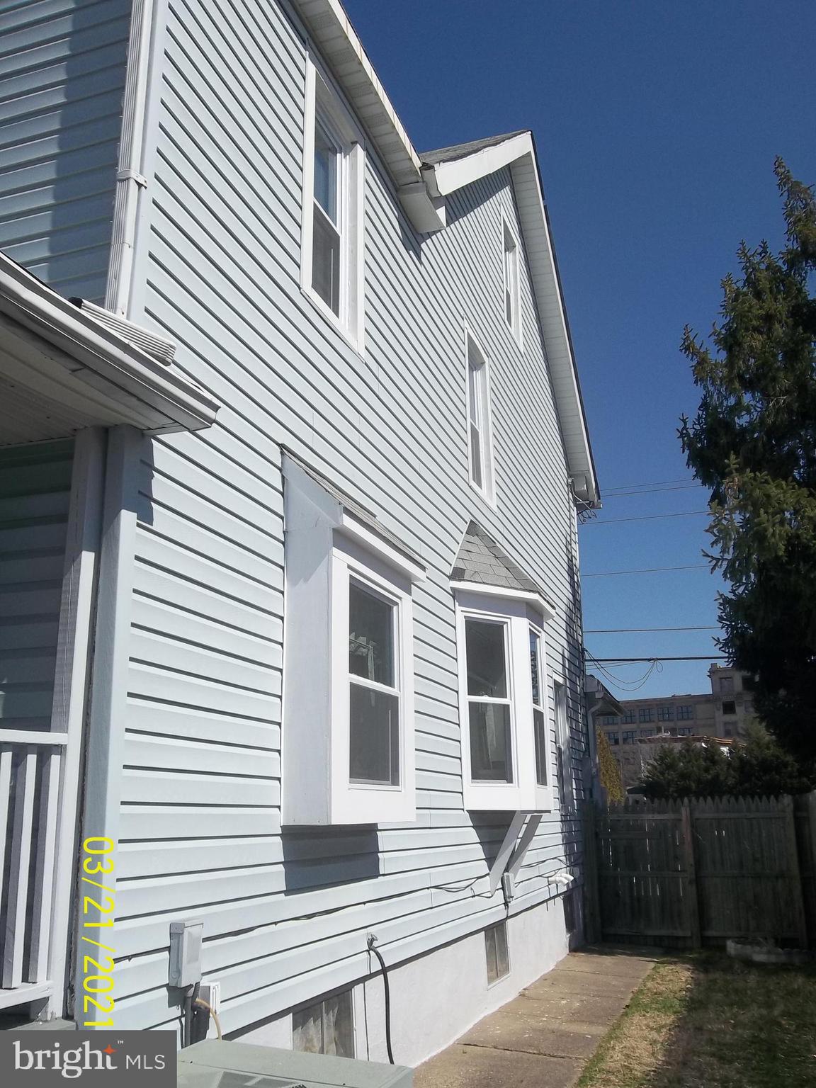 128 Madison Street Riverside, NJ 08075 - Photo 5 of 40 a view of a house with wooden deck