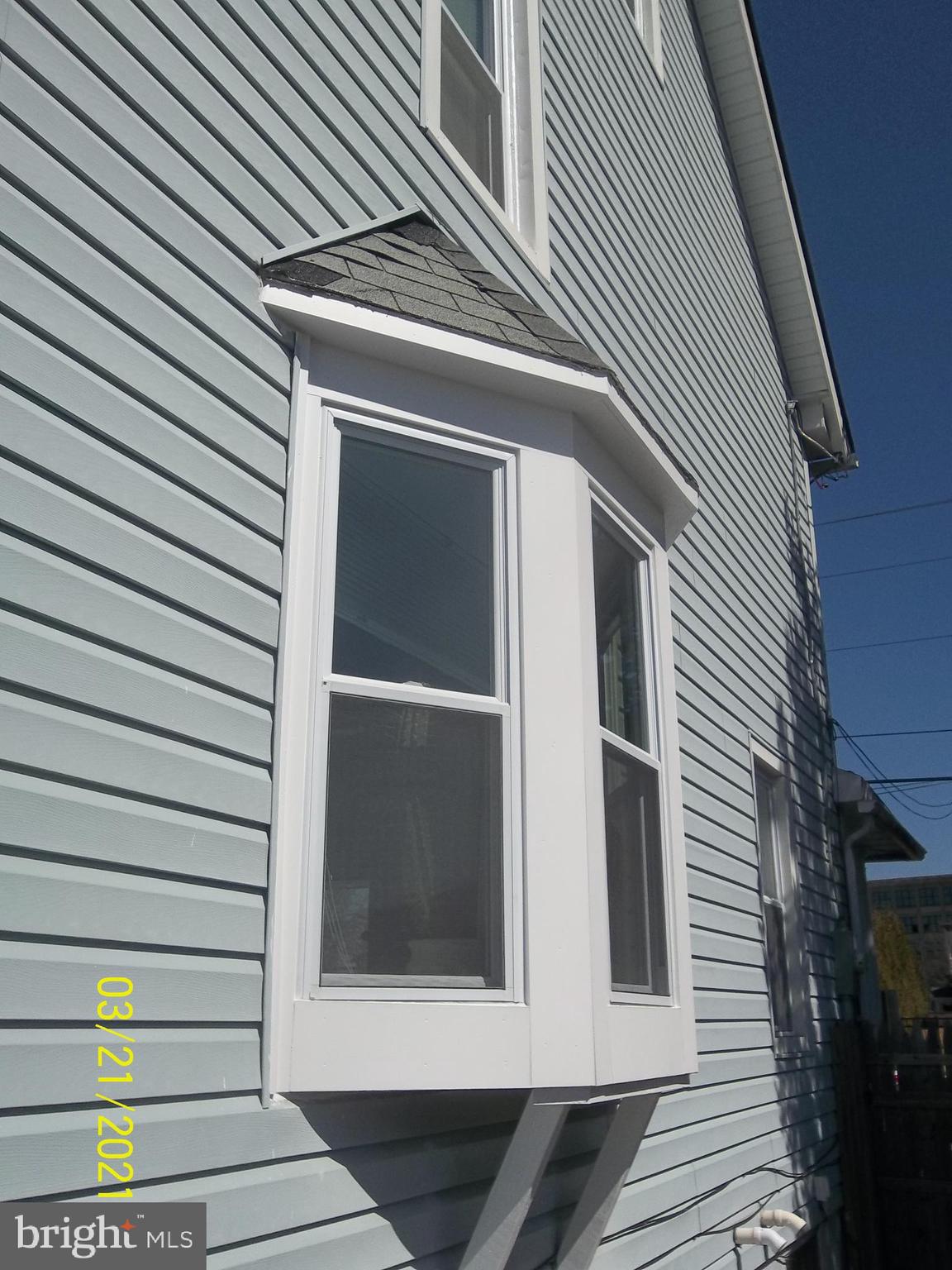 128 Madison Street Riverside, NJ 08075 - Photo 6 of 40 a view of a house with a door and wooden floor