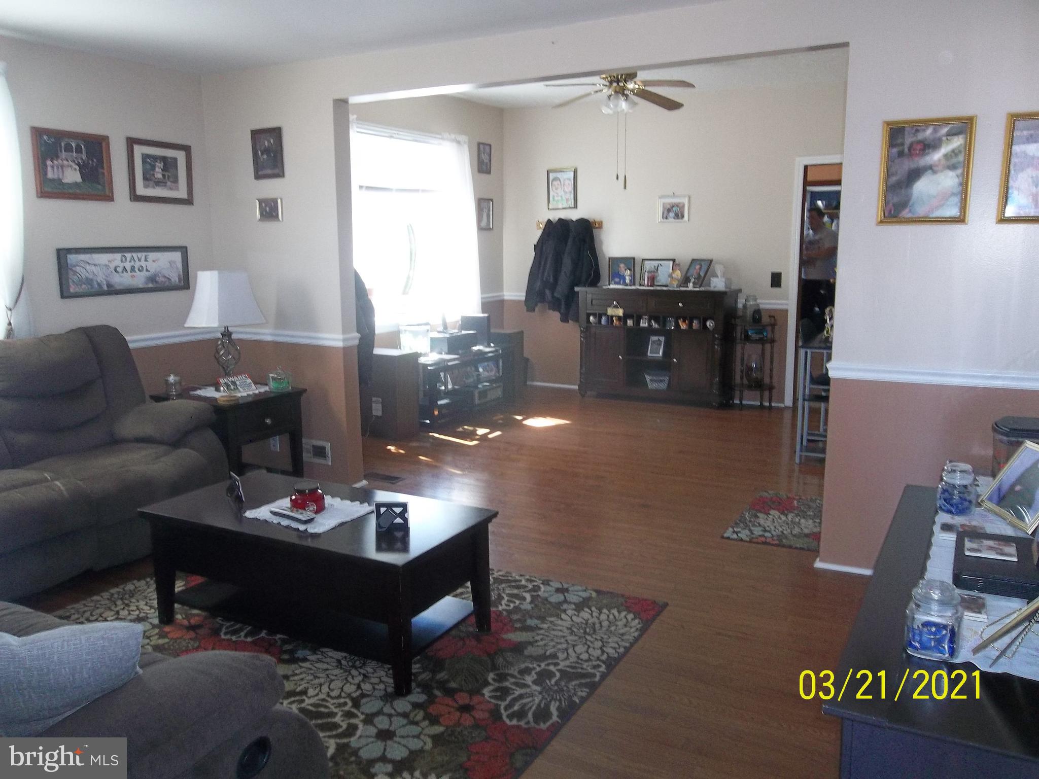 128 Madison Street Riverside, NJ 08075 - Photo 9 of 40 a living room with furniture and wooden floor