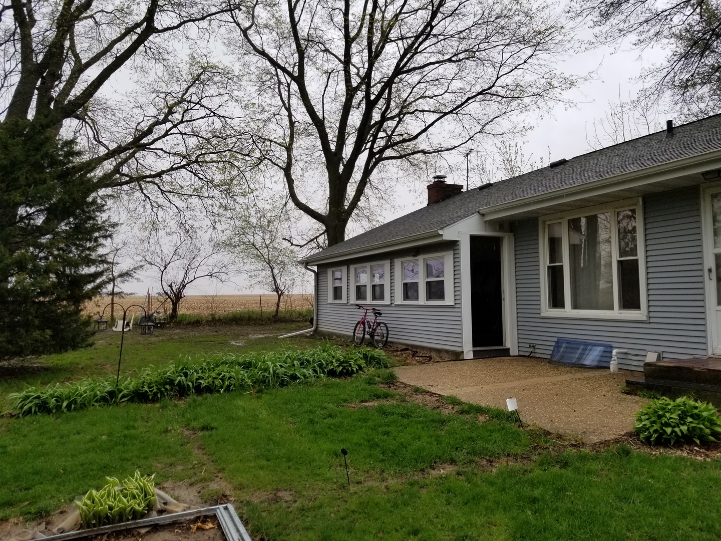 16210 Strawberry Road Morrison, IL 61270 - Photo 14 of 17 a view of a house with a yard