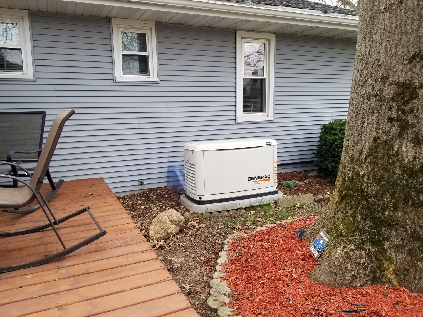 16210 Strawberry Road Morrison, IL 61270 - Photo 17 of 17 a view of a backyard with chairs and a large tree