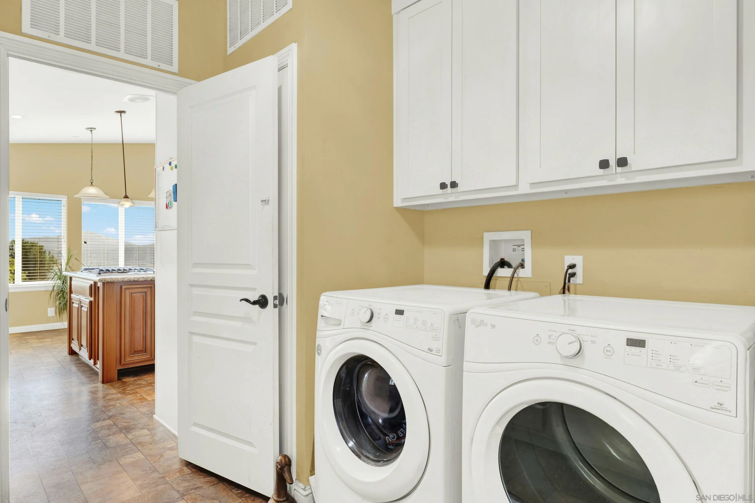 20885 Daum Road Jamul, CA 91935 - Photo 17 of 36 a view of entryway with washer and dryer