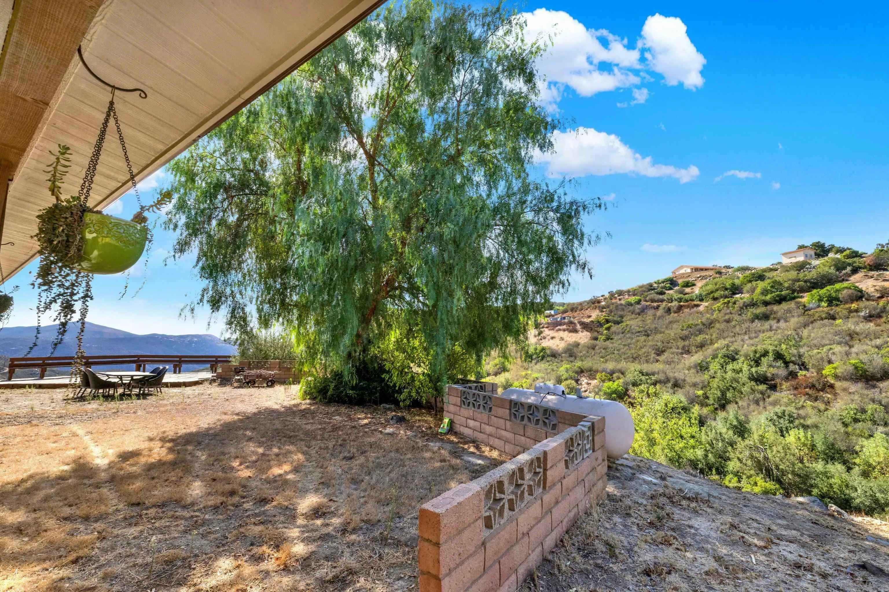 20885 Daum Road Jamul, CA 91935 - Photo 34 of 36 a view of a backyard with chairs