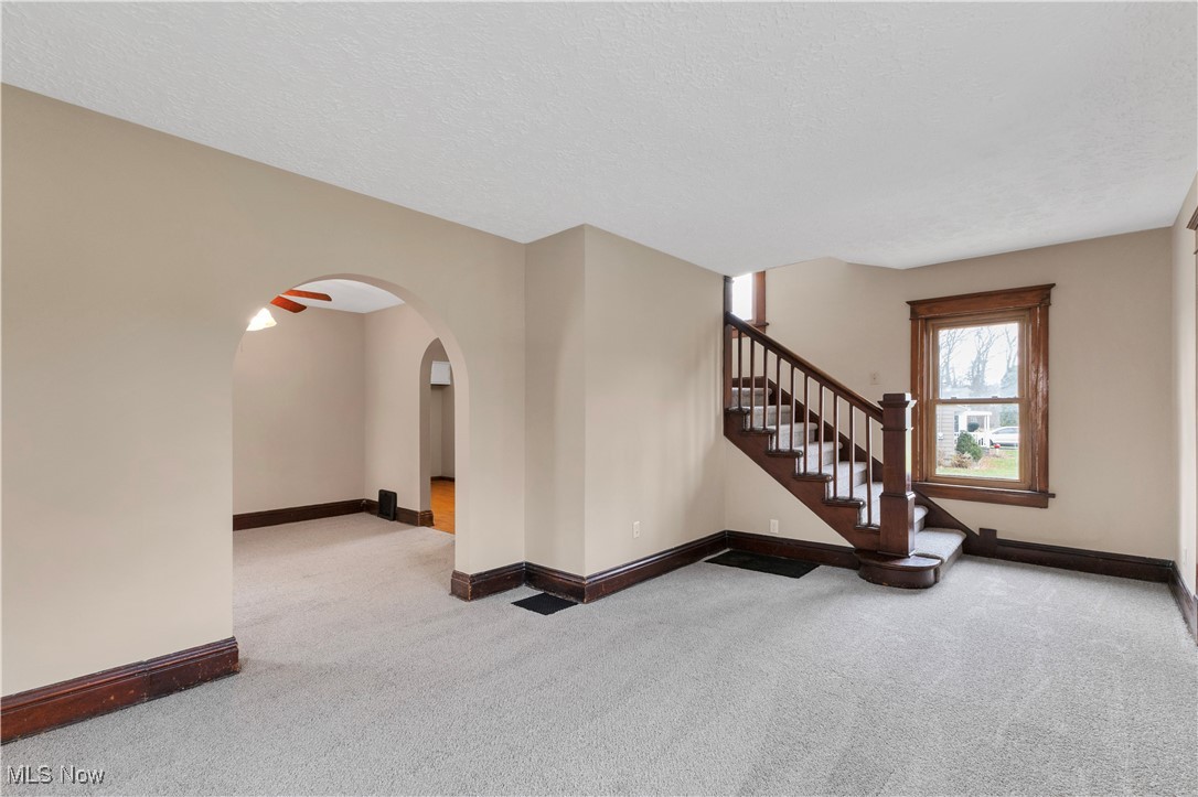 48265 Middle Ridge Road Amherst, OH 44001 - Photo 9 of 43 Living room - freshly painted w/ neutral color and new carpeting