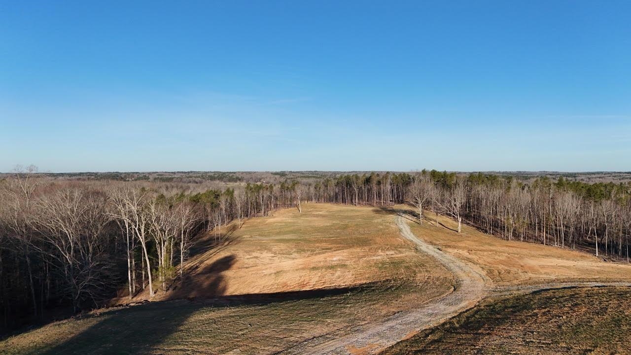 0 Old Enon Road Middleton, TN 38052 - Photo 13 of 19 a view of a swimming pool with an outdoor space and seating area