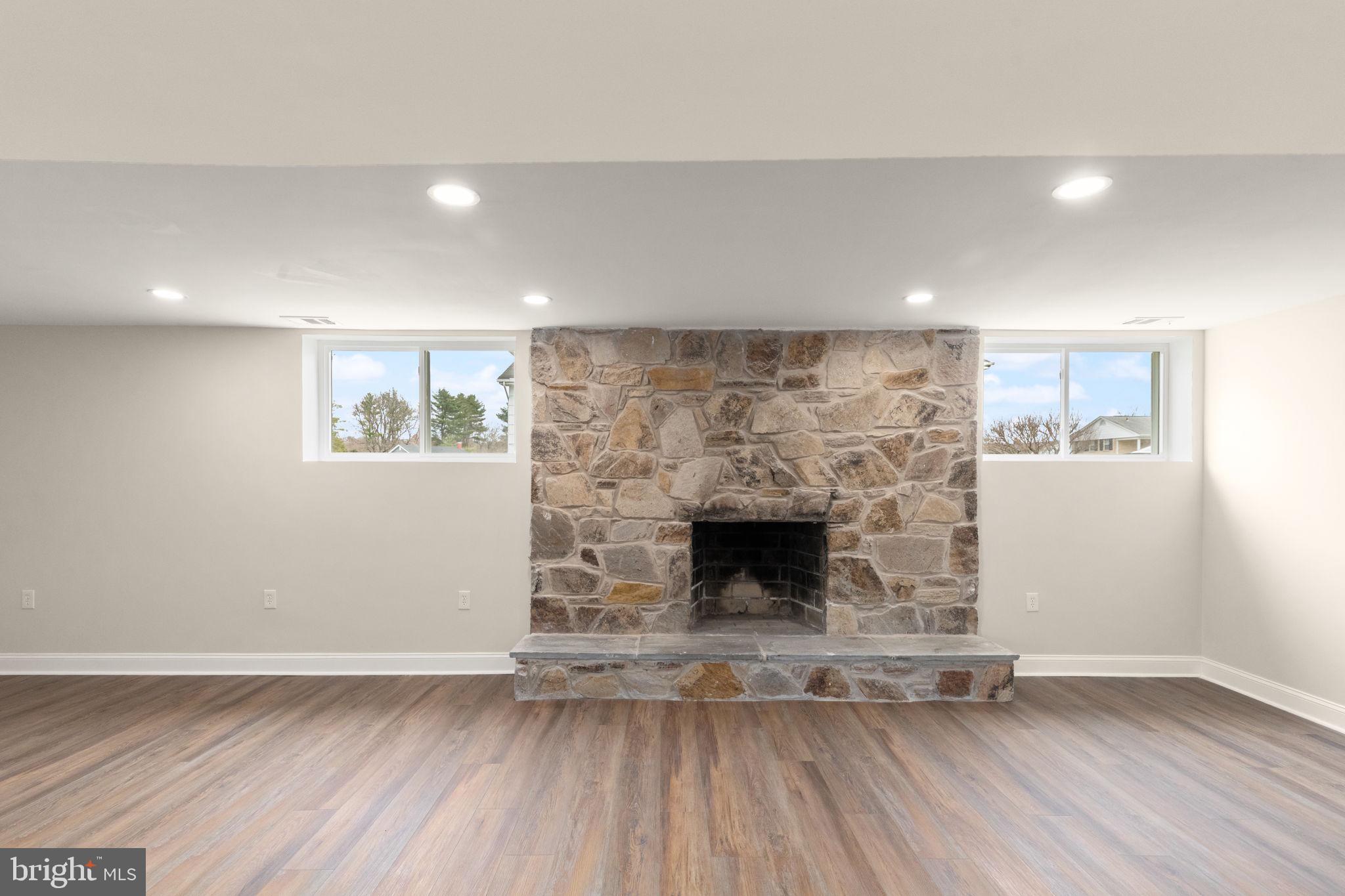 9708 Eustice Road Randallstown, MD 21133 - Photo 27 of 42 Lower Level Wood Burning Fireplace