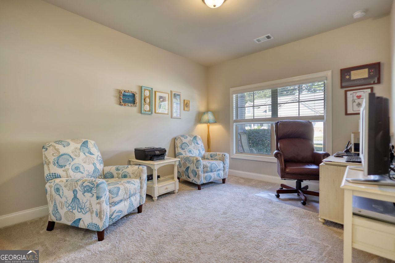 246 Club Drive Monroe, GA 30655 - Photo 15 of 18 a living room with furniture and a window