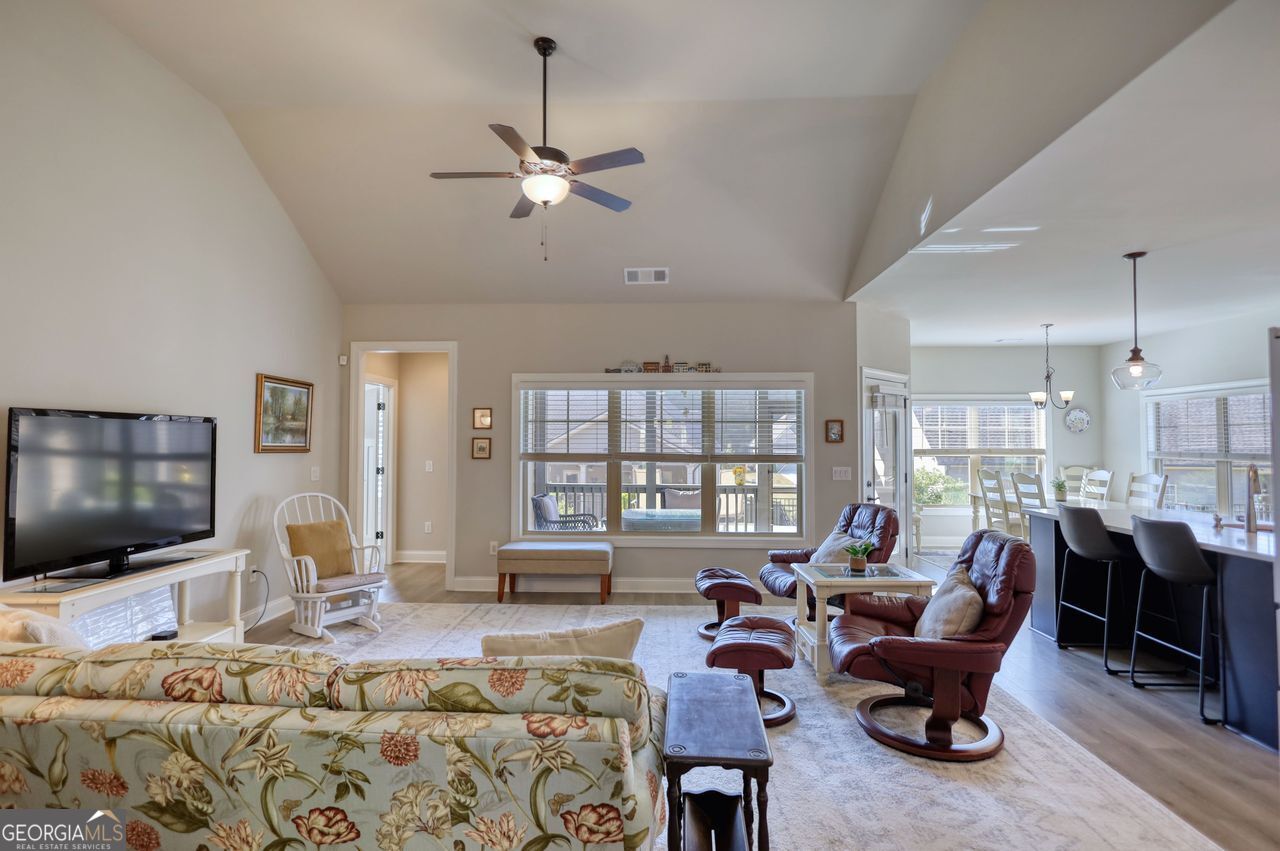 246 Club Drive Monroe, GA 30655 - Photo 5 of 18 a living room with furniture and a flat screen tv