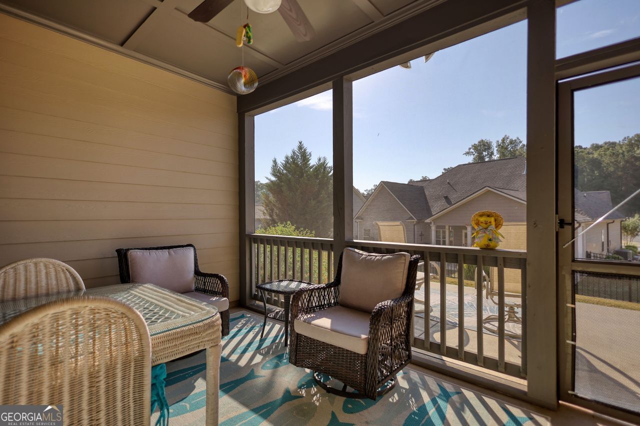 246 Club Drive Monroe, GA 30655 - Photo 8 of 18 a view of a balcony with furniture