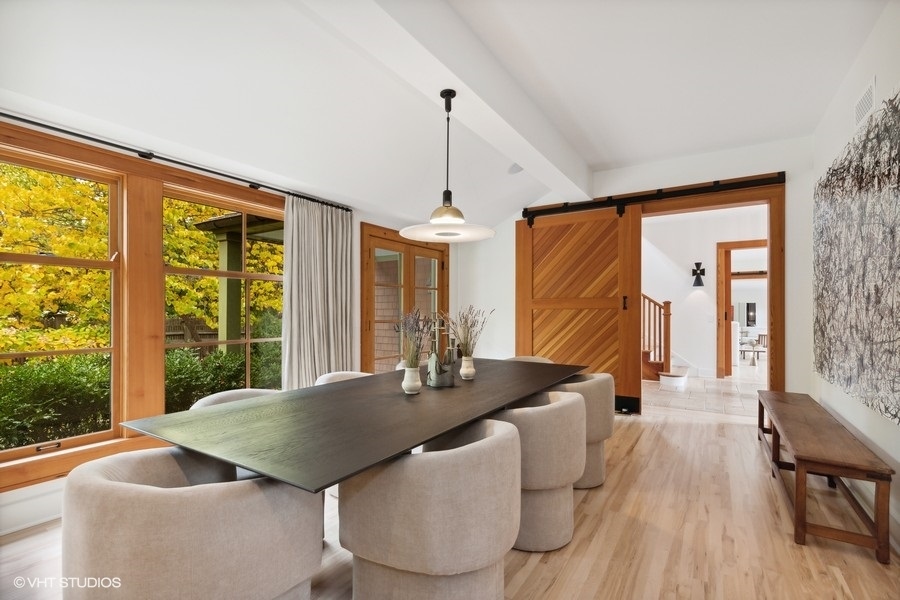 606 Tiverton Road Lake Forest, IL 60045 - Photo 11 of 48 a dining room with furniture and wooden floor