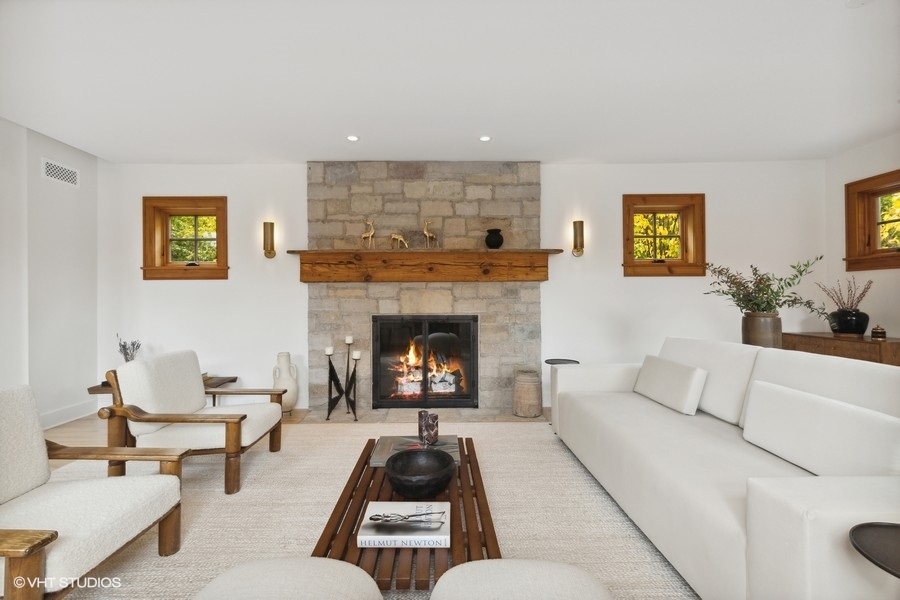 606 Tiverton Road Lake Forest, IL 60045 - Photo 8 of 48 a living room with furniture and a fireplace