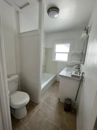 a bathroom with a sink and a toilet