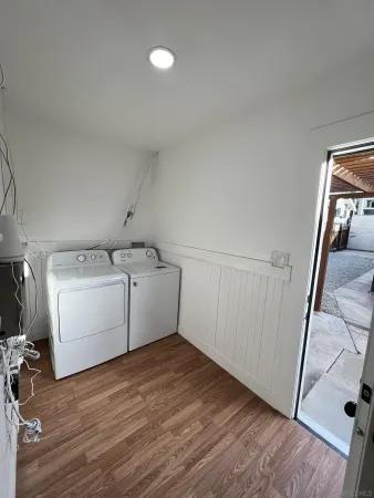 a utility room with a washer and dryer
