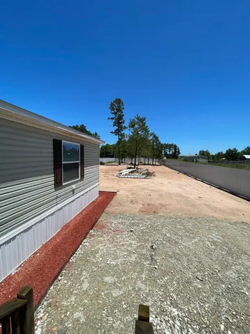a view of a terrace with a garden