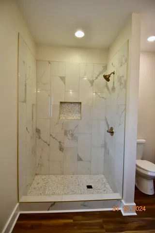 a view of a room with rack on the wall