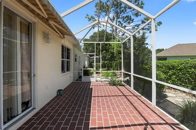 a view of balcony with wooden floor