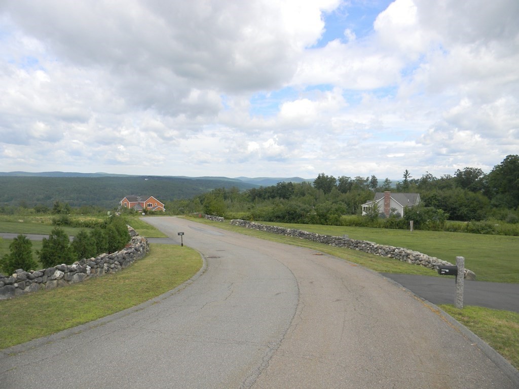 0 Ridge Road Athol, MA 01331 - Photo 3 of 10 a view of a street with houses in the background